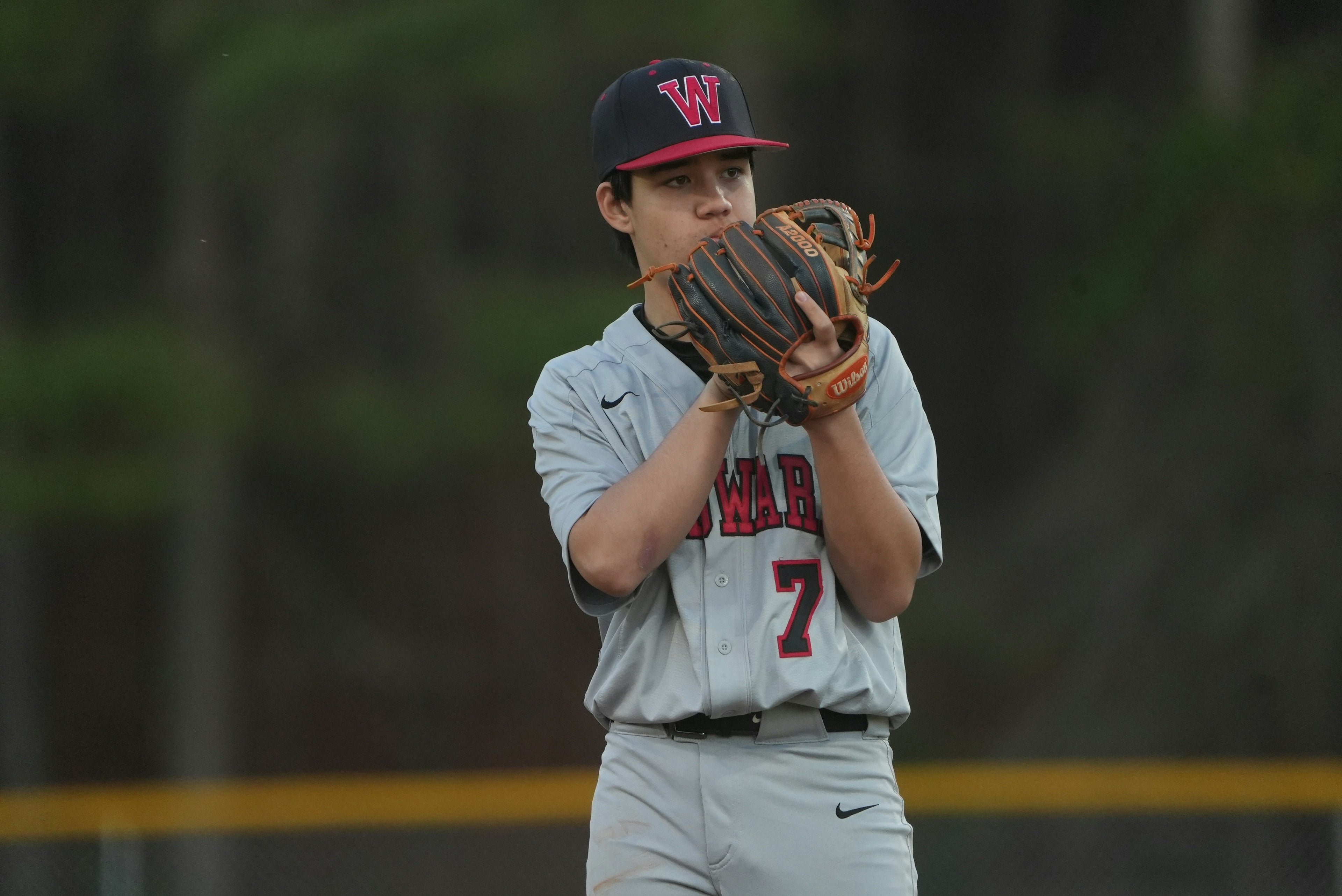 Baseball fielder staying mentally focused and composed during competition Mack Mental Performance mental performance coaching Tampa Bay